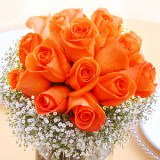 Wedding Centerpieces with Orange Roses & Baby's Breath